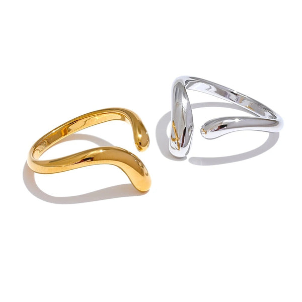 Gold-plated stainless steel ring with a unique design featuring two intertwined bands.