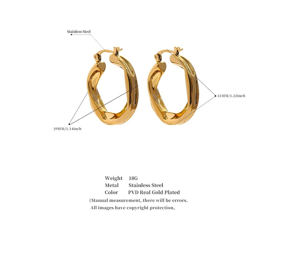 Geometric earrings in gold-plated 316L stainless steel.