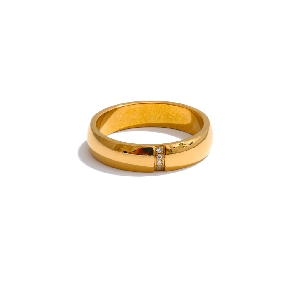 Gold-plated stainless steel ring with cubic zirconia.