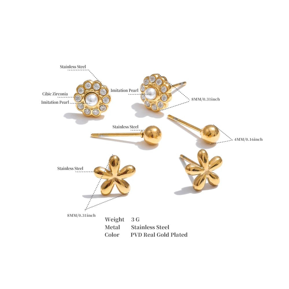 Cubic zirconia flower earrings in gold-plated stainless steel with cubic zirconia.