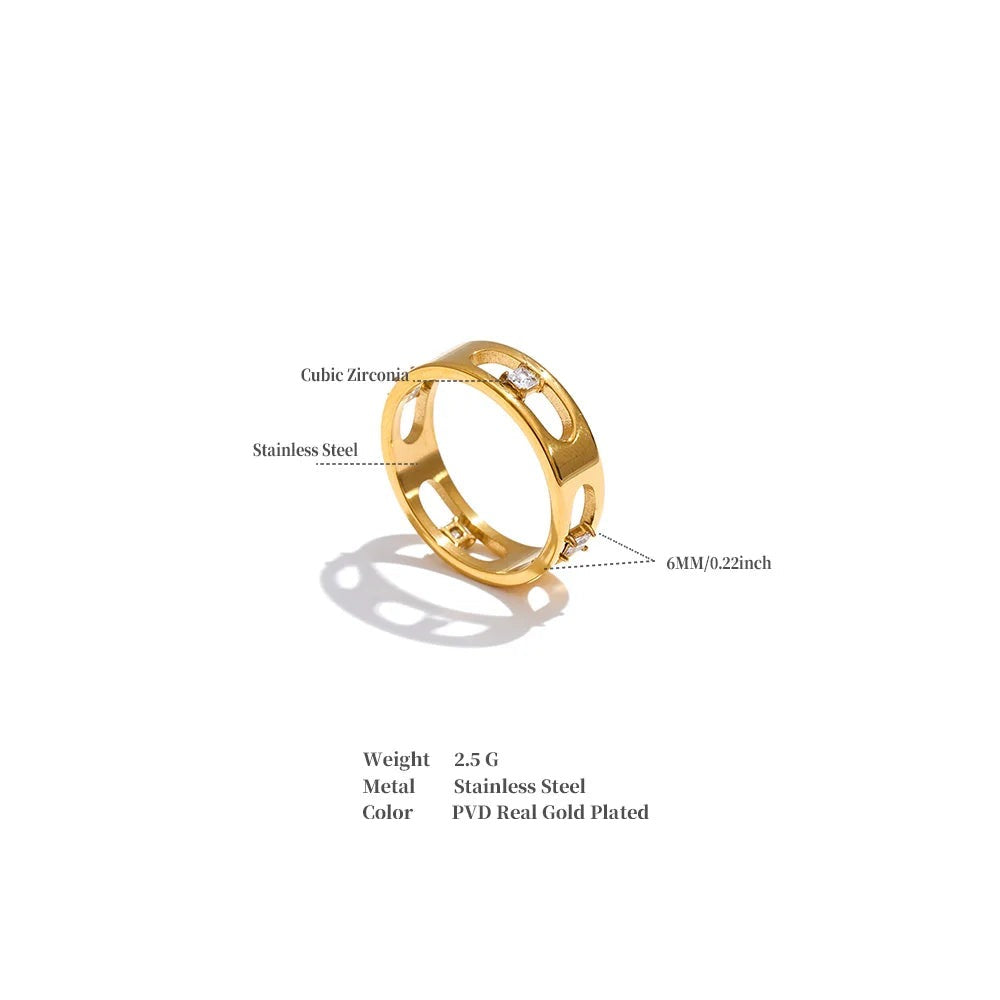 Cubic zirconia geometric ring in 18K gold-plated stainless steel with cubic zirconia.