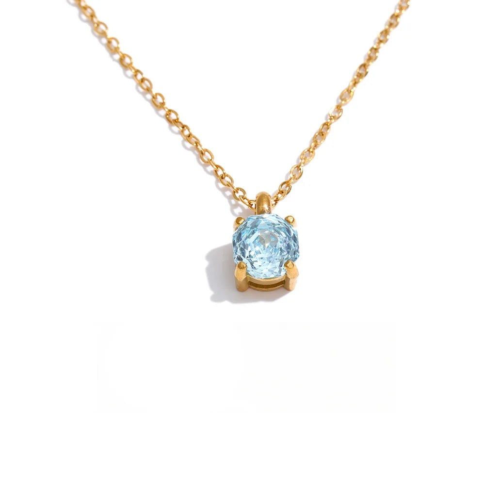 Gold-plated stainless steel necklace with a blue cubic zirconia stone.