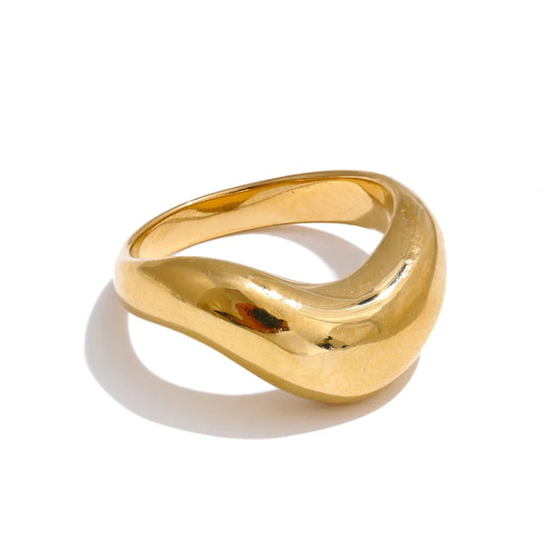 Gold ring with a curved band.