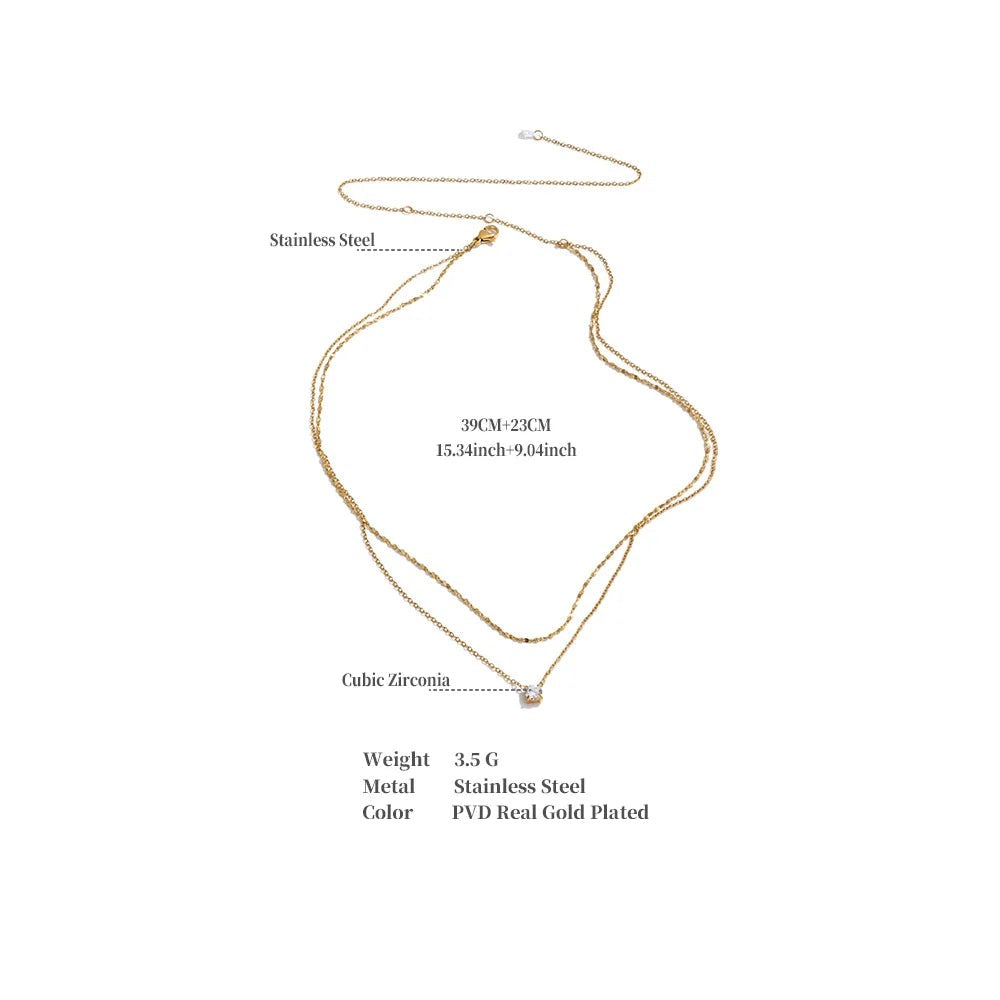 Cubic zirconia geometric chain necklace in gold-plated stainless steel with cubic zirconia.