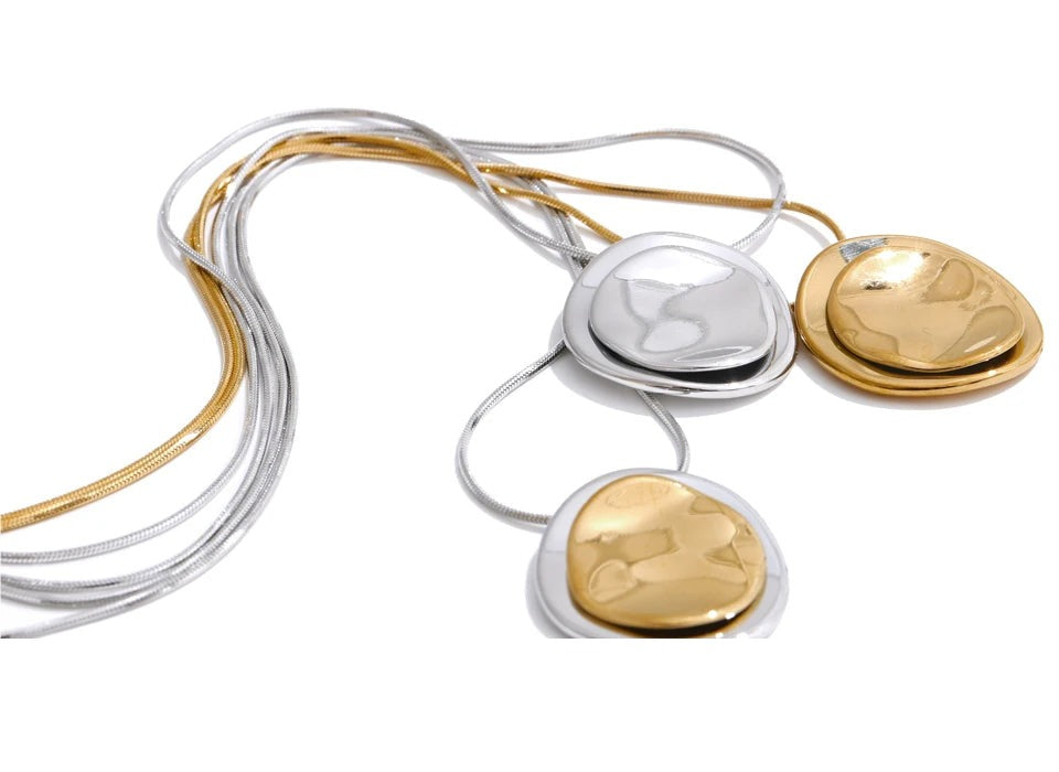 Coin geometric necklace in gold-plated stainless steel.