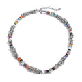 Glass natural stone geometric necklace in gold-plated stainless steel with natural stone.