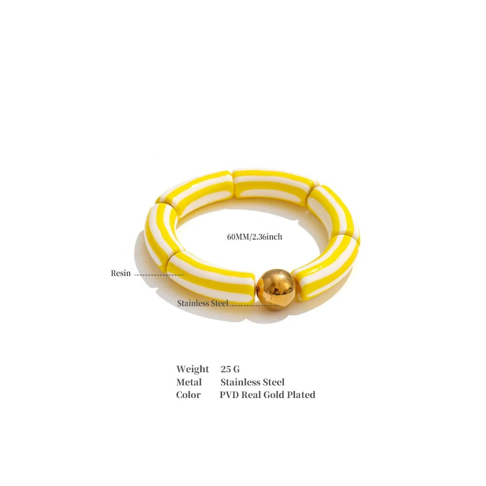 Resin acrylic multi-color bracelet in gold-plated stainless steel with resin and acrylic.