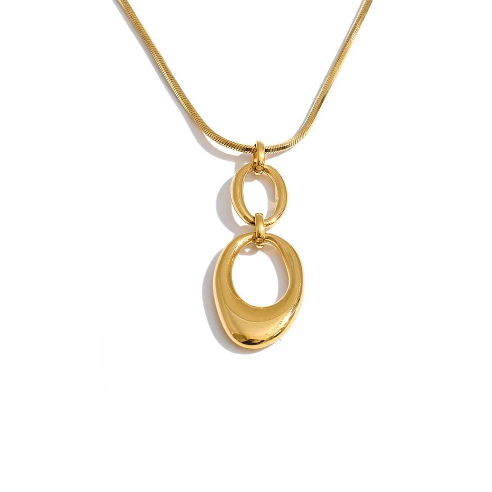 Gold-plated stainless steel necklace featuring a large oval pendant.