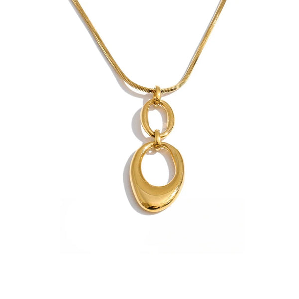 Gold-plated stainless steel necklace featuring a large oval pendant.