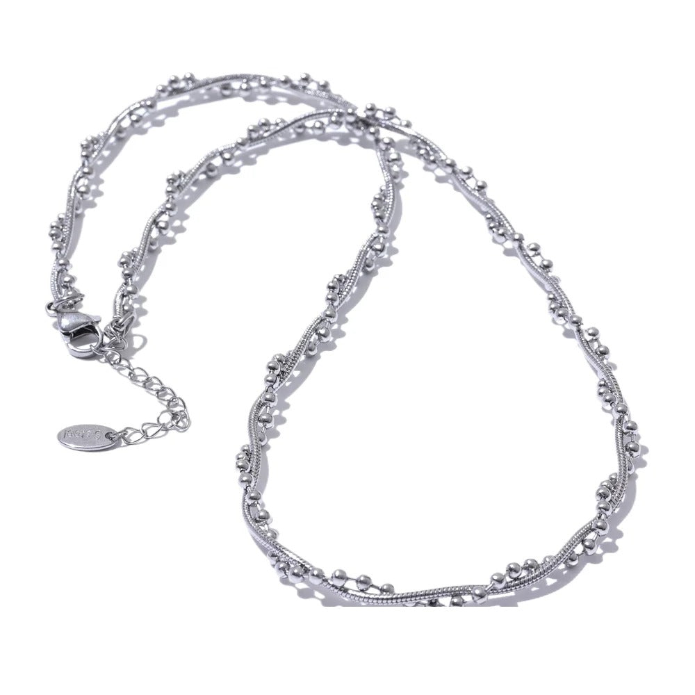 Geometric chain necklace in gold-plated stainless steel.