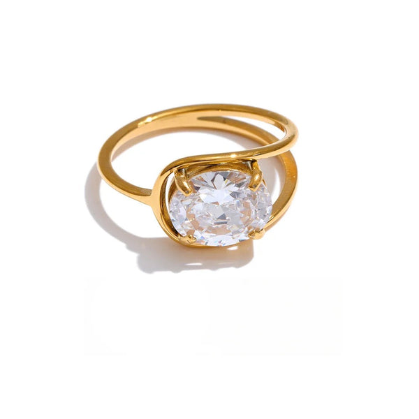 Gold-plated ring with cubic zirconia center stone.