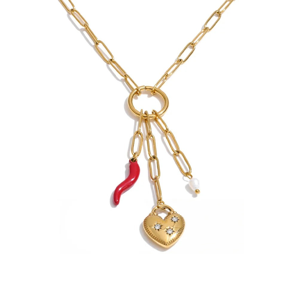 Gold-plated stainless steel necklace with freshwater pearl and cubic zirconia charm featuring a red heart and a small gold bell.