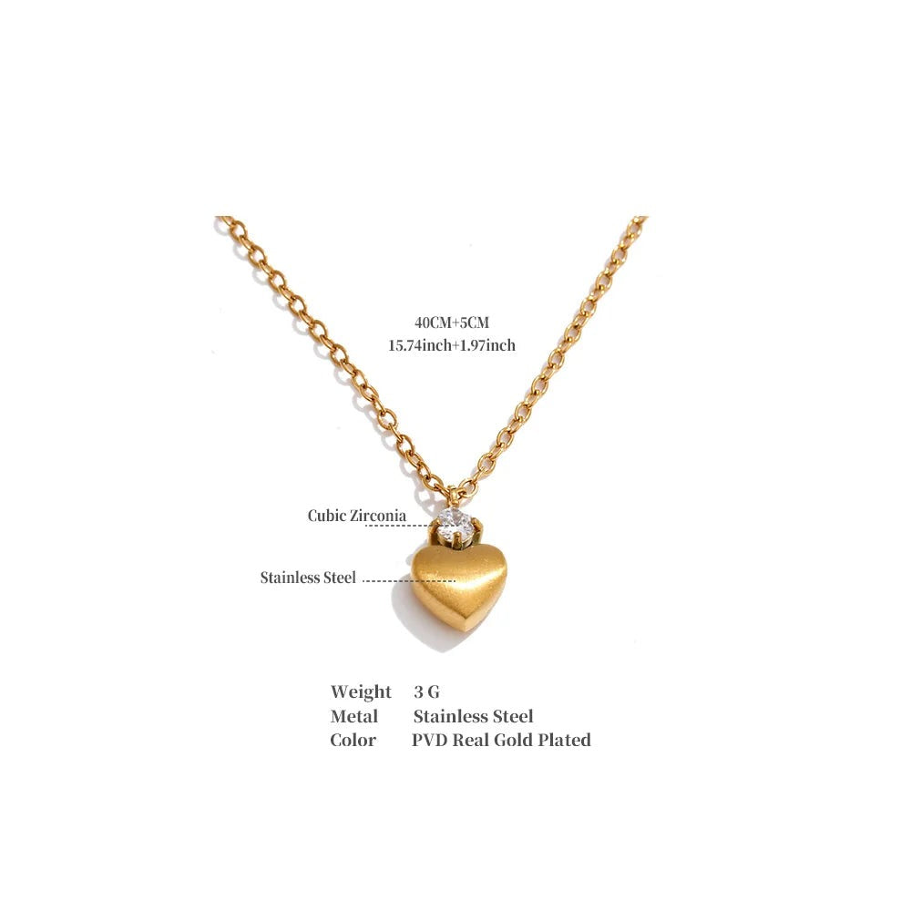 Cubic zirconia heart necklace in gold-plated stainless steel with cubic zirconia.