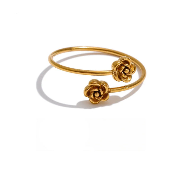 Gold-plated stainless steel ring with floral design.