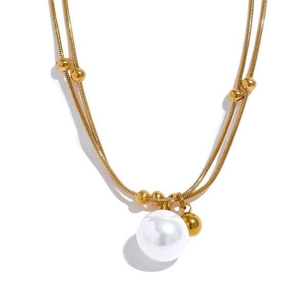 Gold-plated stainless steel necklace with pearl pendant.