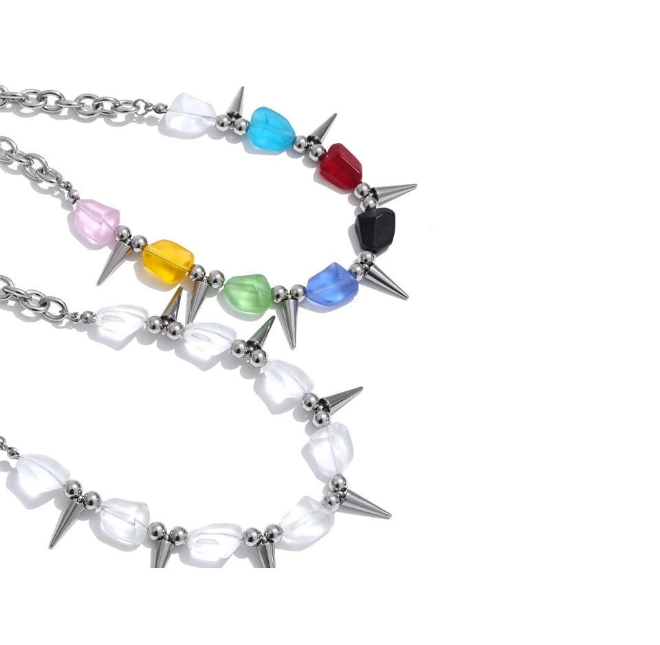 Acrylic natural stone multi-color necklace in gold-plated stainless steel with natural stone and acrylic.