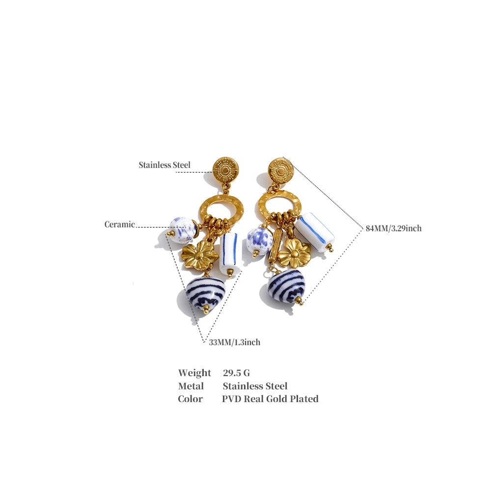 Blue heart flower earrings in gold-plated stainless steel.