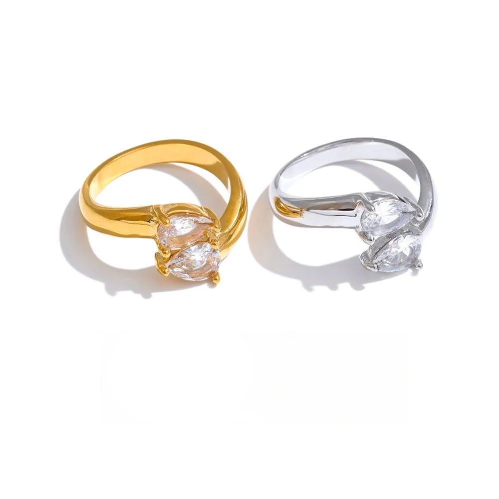 Gold-plated stainless steel ring with cubic zirconia stones.