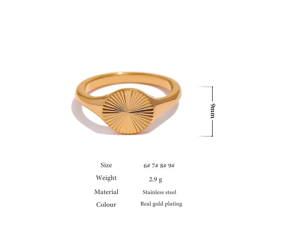Geometric ring in gold-plated stainless steel.