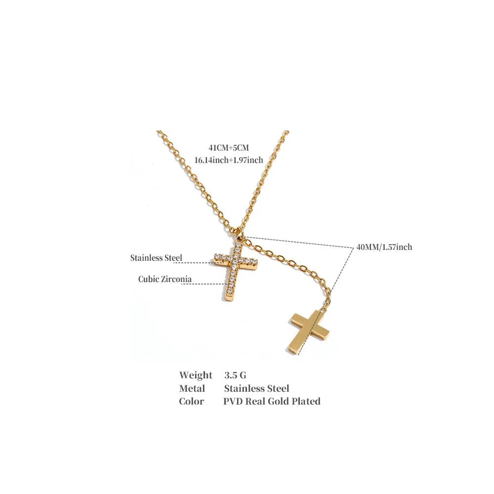 Cubic zirconia cross chain necklace in gold-plated stainless steel with cubic zirconia.