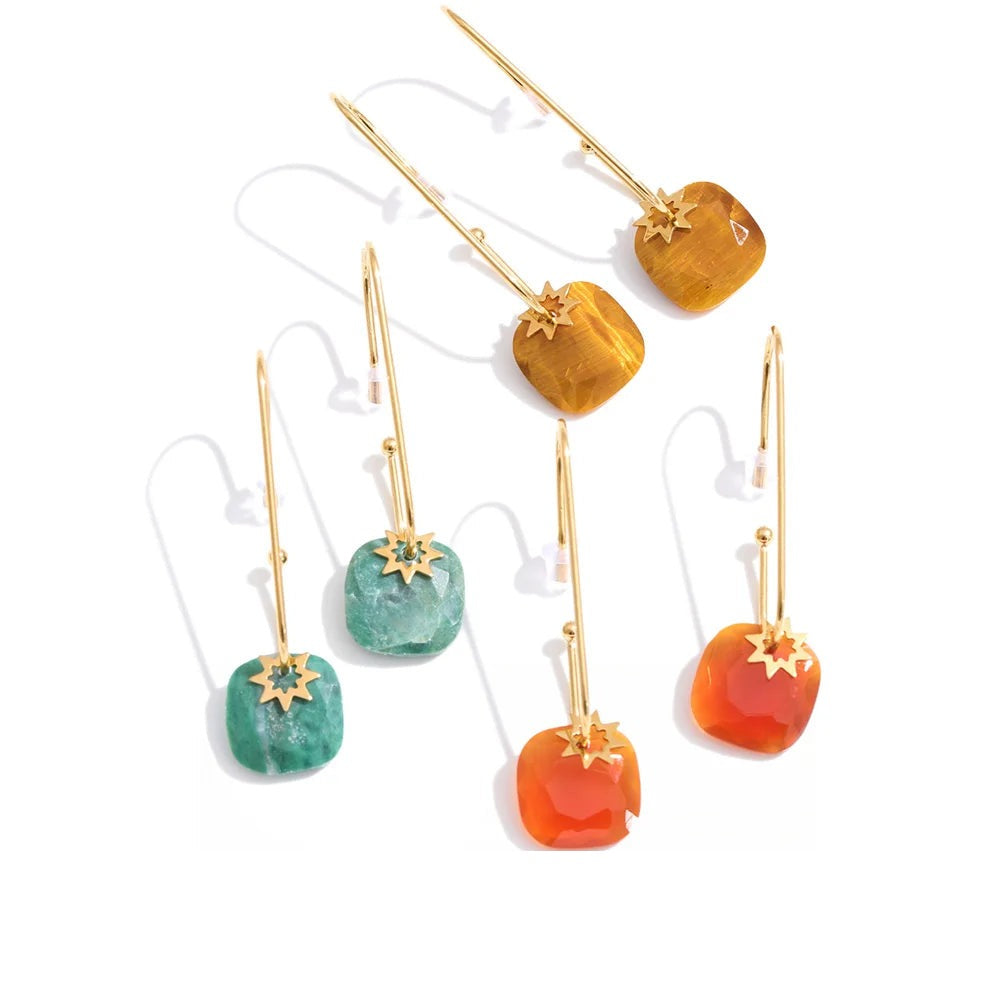 Earrings made of gold-plated stainless steel with natural stone accents.