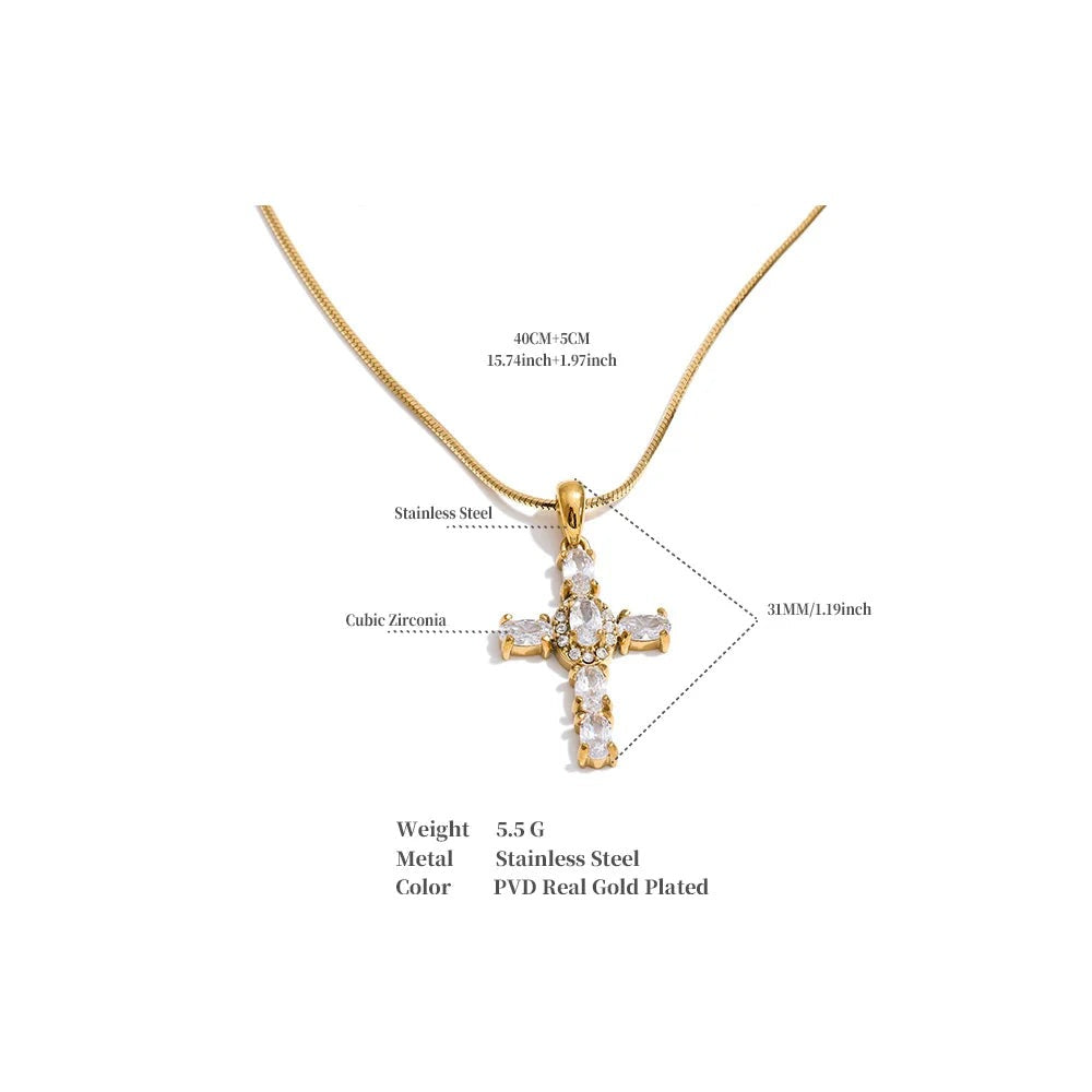 Cubic zirconia cross necklace in gold-plated stainless steel with cubic zirconia.