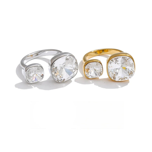 Gold-plated stainless steel ring with cubic zirconia stones.