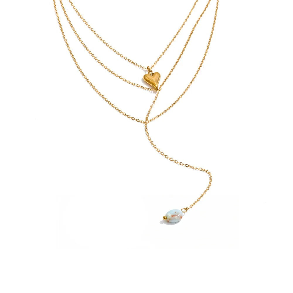 Gold-plated stainless steel necklace with a blue stone pendant.
