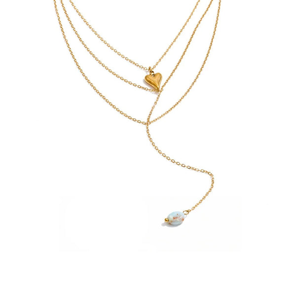 Gold-plated stainless steel necklace with a blue stone pendant.