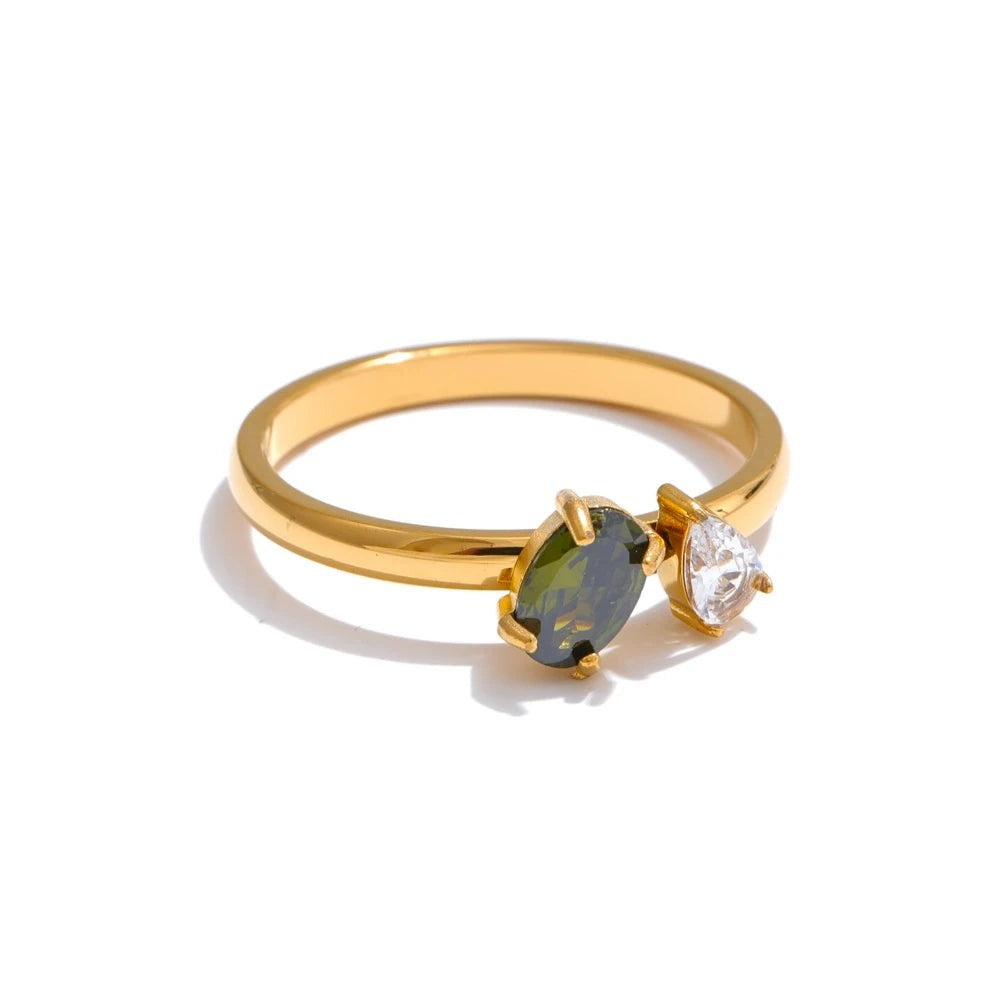 Gold ring with cubic zirconia stones.