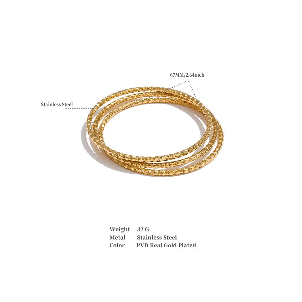Geometric bracelet in gold-plated stainless steel.