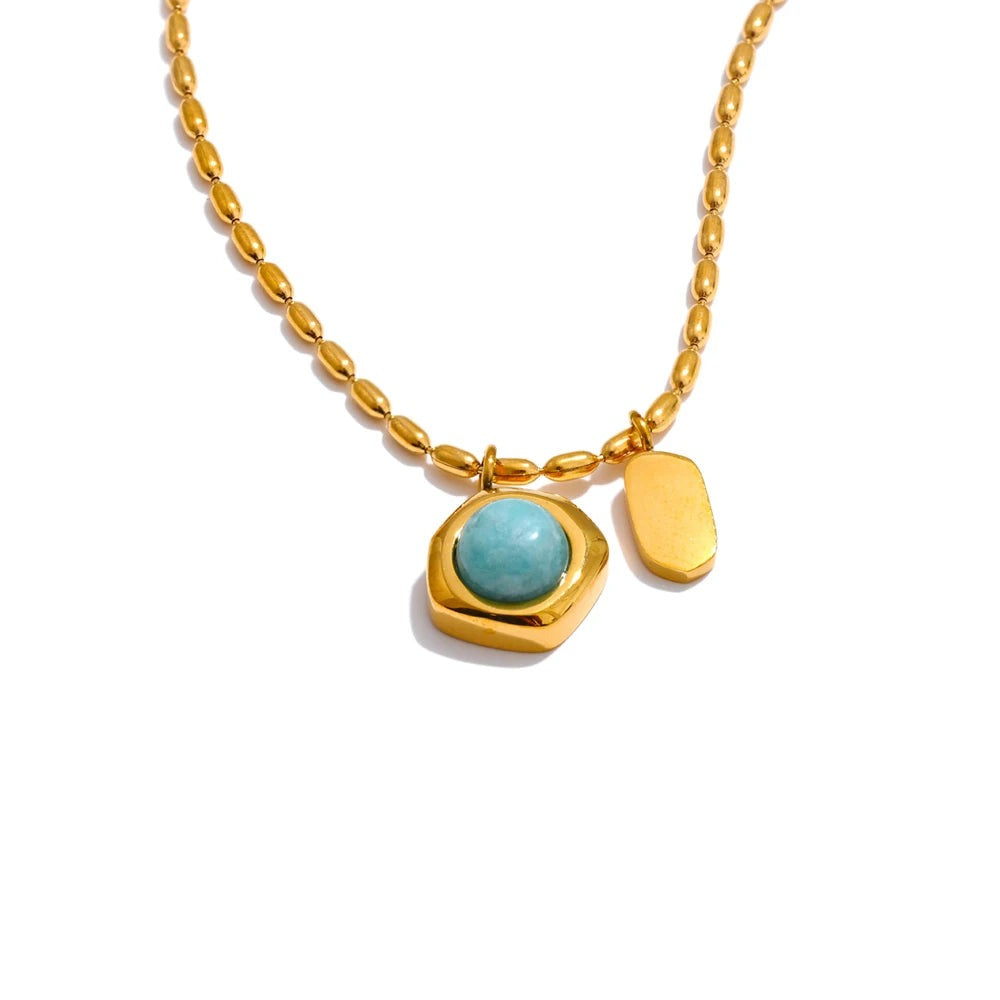 Gold-plated stainless steel necklace with natural stone pendant featuring a blue stone and two gold stones.