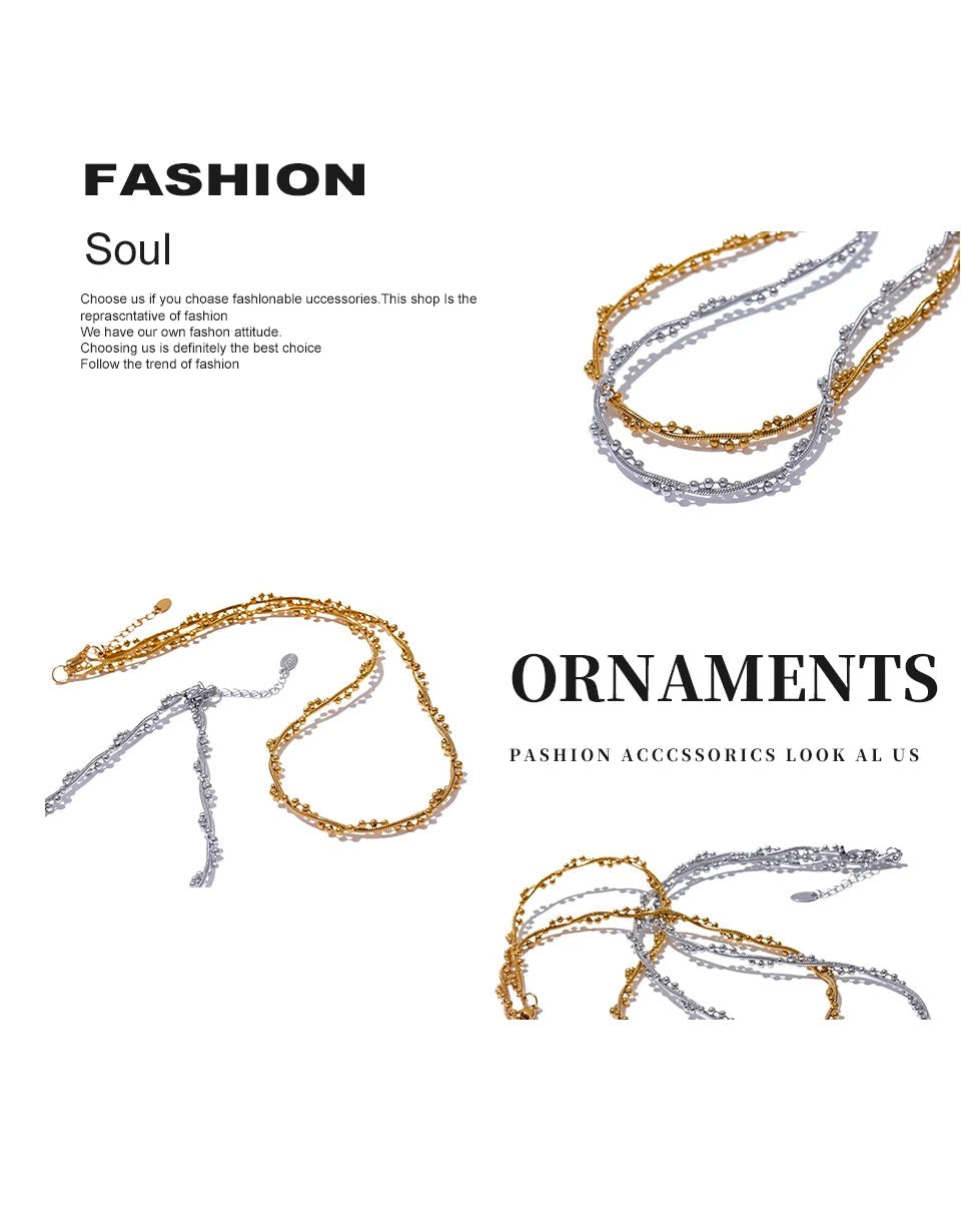 Geometric chain necklace in gold-plated stainless steel.