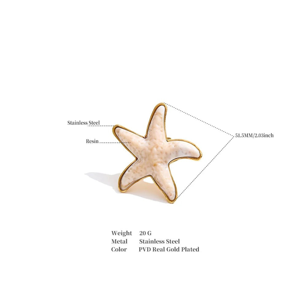Resin acrylic star ring in 18K gold-plated stainless steel with resin and acrylic.