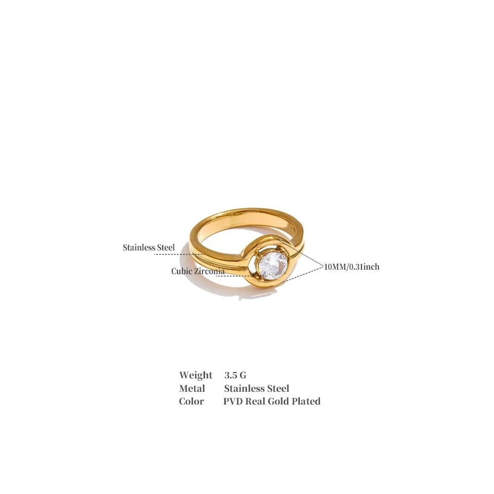 Cubic zirconia geometric ring in 18K gold-plated stainless steel with cubic zirconia.