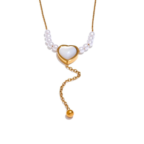 Gold-plated stainless steel necklace with pearl and natural stone pendant featuring a snake design and a heart charm.