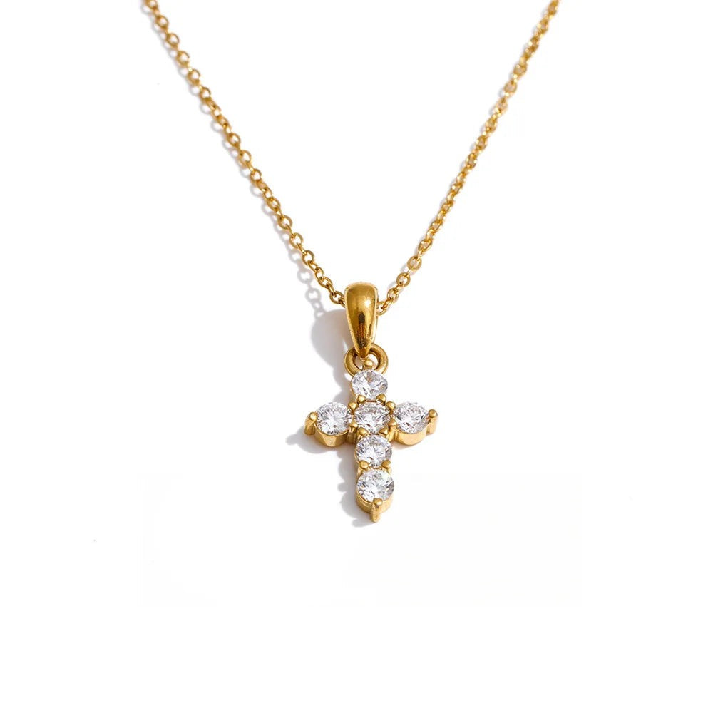 Gold-plated stainless steel necklace with cubic zirconia cross pendant.