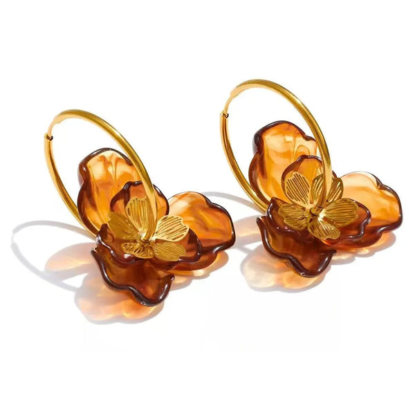 Gold-plated stainless steel earrings with resin flowers.