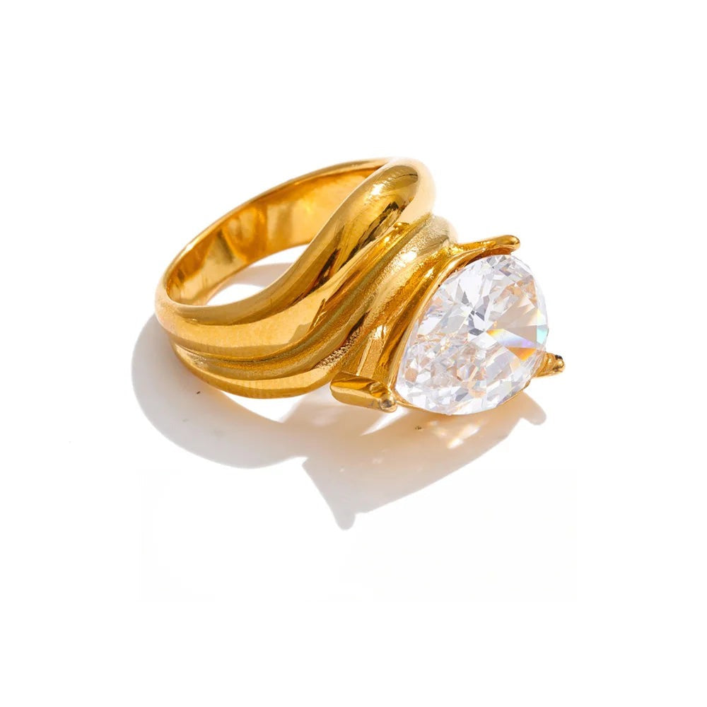 Gold ring with cubic zirconia stones.