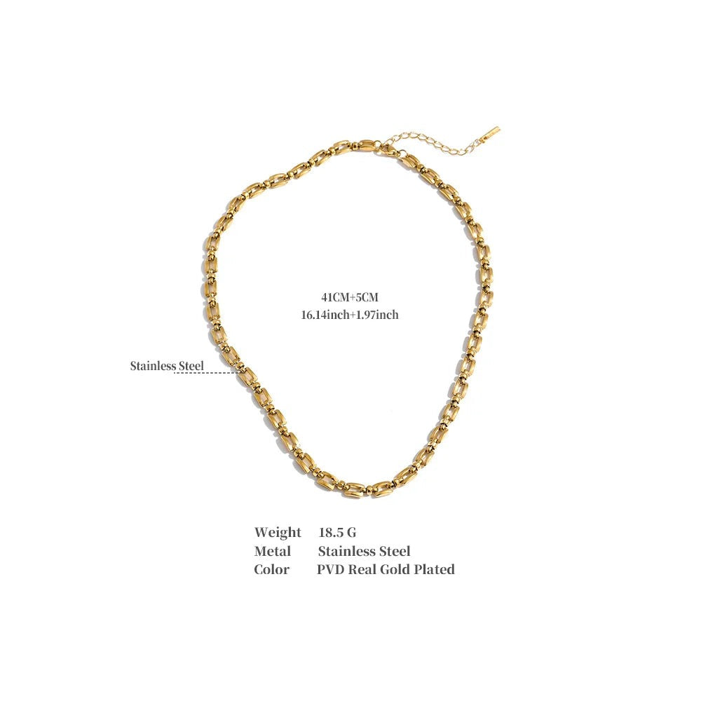 Geometric chain necklace in gold-plated stainless steel.