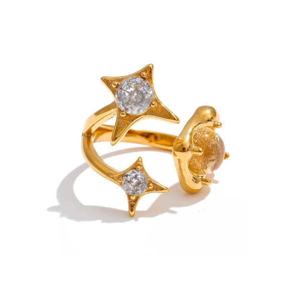 Gold-plated ring with cubic zirconia stars.