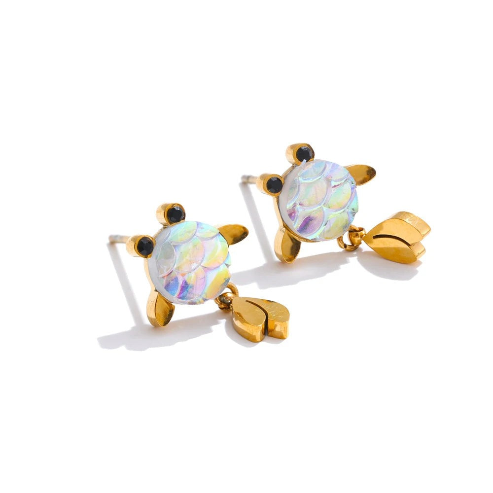 Gold-plated stainless steel earrings with resin turtle design.