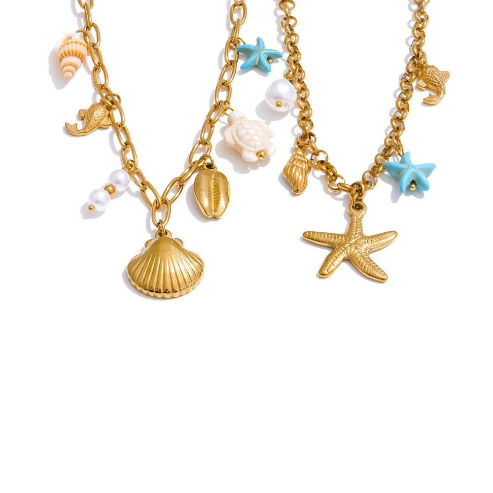 Gold-plated stainless steel necklace with shells and sea creatures.