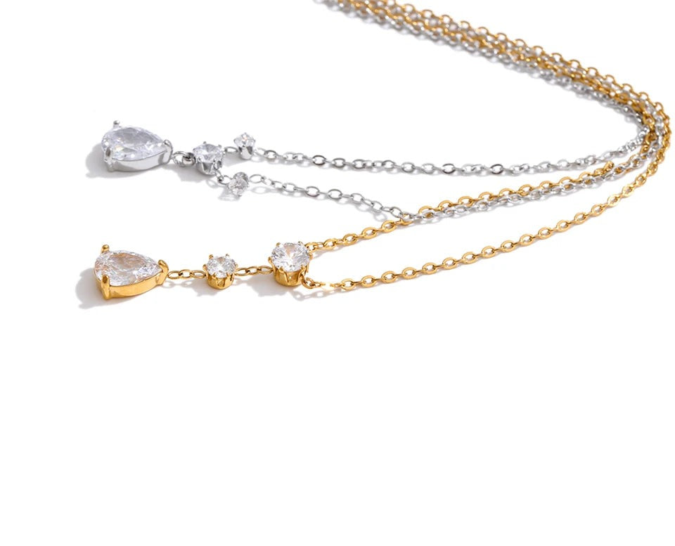 Cubic zirconia geometric necklace in gold-plated stainless steel with cubic zirconia.