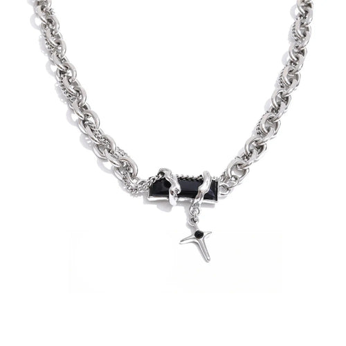 Gold-plated stainless steel necklace with black stone pendant featuring a chain link design.