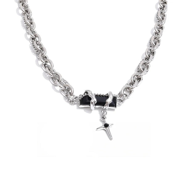 Gold-plated stainless steel necklace with black stone pendant featuring a chain link design.