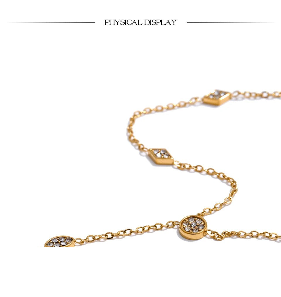 Cubic zirconia geometric chain necklace in gold-plated stainless steel with cubic zirconia.
