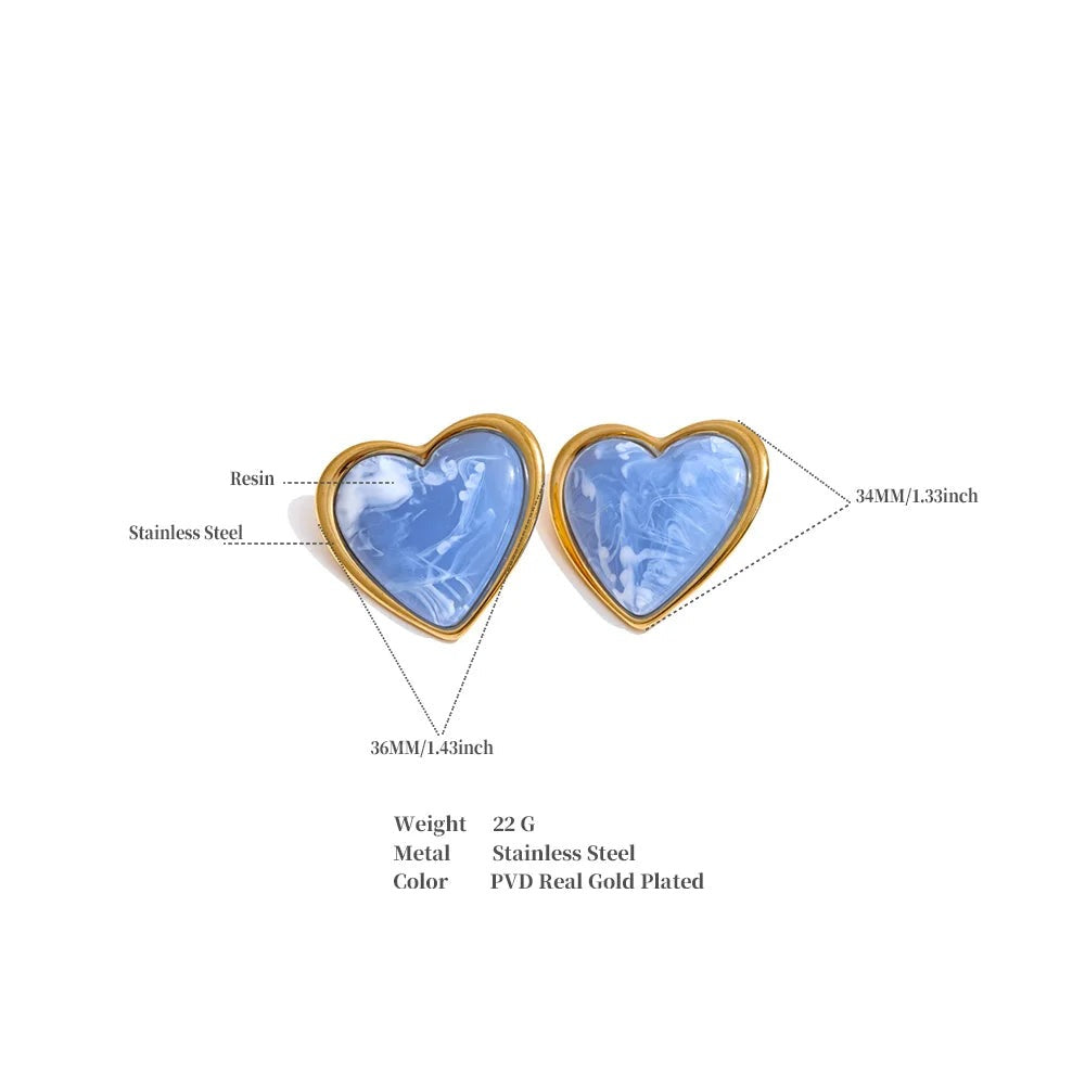 Resin acrylic heart earrings in gold-plated stainless steel with resin and acrylic.