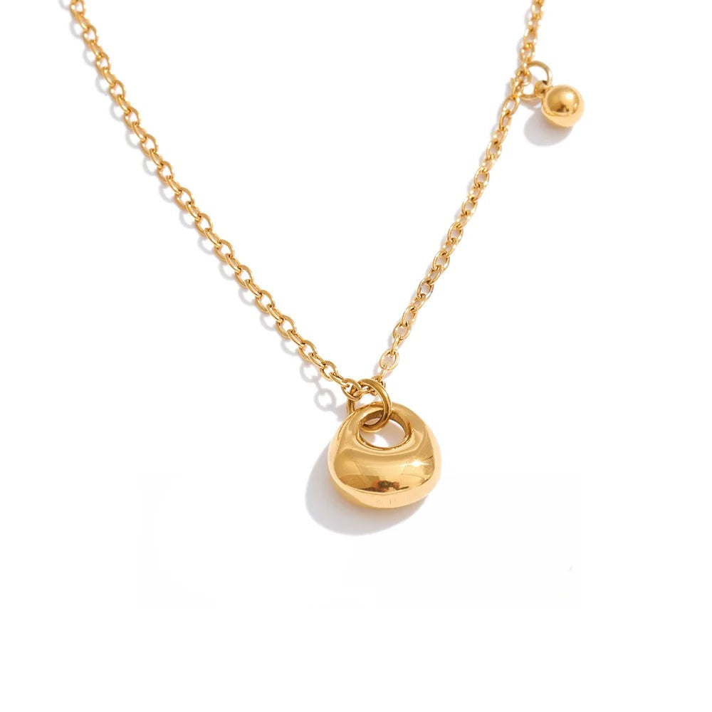 Gold-plated stainless steel necklace featuring a small pendant.