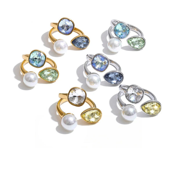 Gold-plated stainless steel ring with pearl and crystal accents.